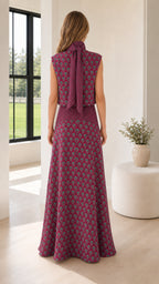 Back view of model in berry two-piece set showing tie detail