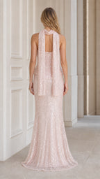 Back view of pink sequin formal dress showing scarf drape
