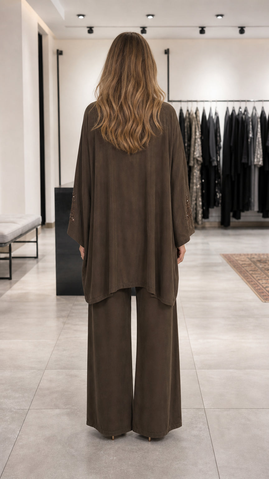Back view of model wearing brown embroidered lounge set