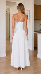 Back view of white one-shoulder maxi dress