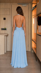Back view showing open back design of light blue maxi dress