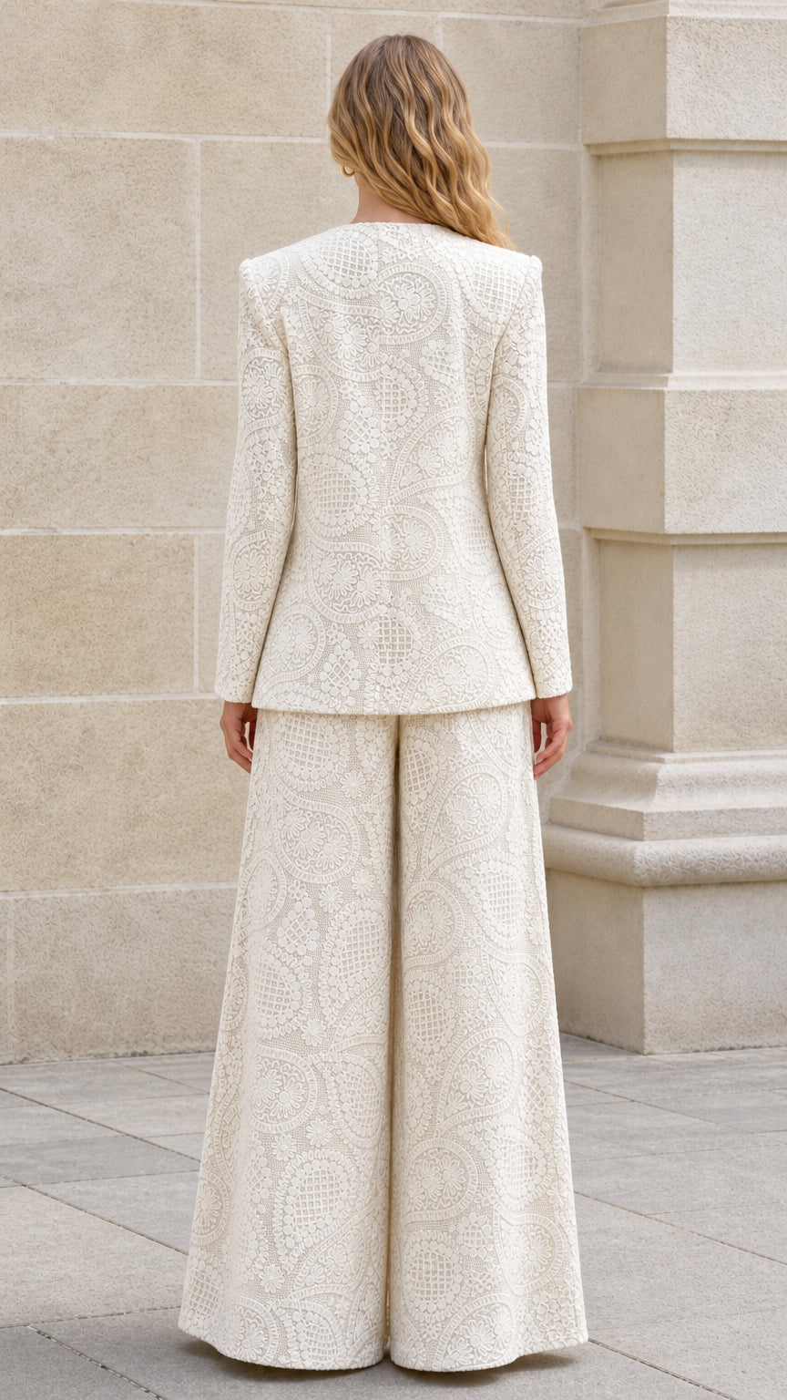 Back view of cream blazer and trousers