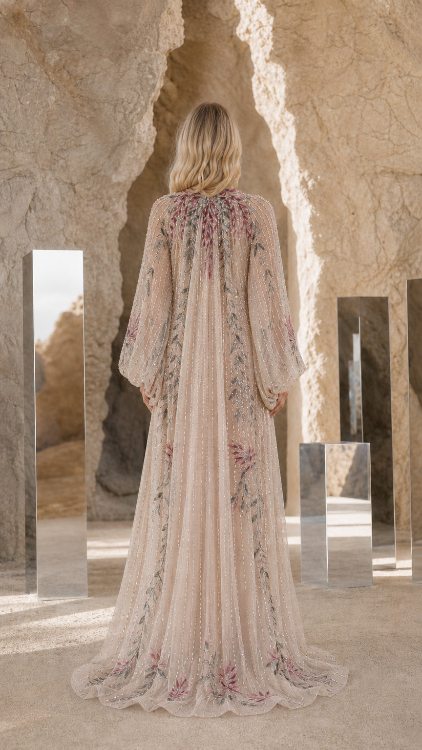 Back view of Champagne evening gown showing flowing sweep train