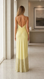 Back view of yellow spaghetti strap maxi dress