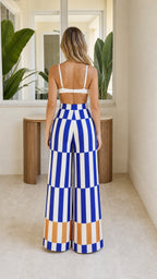 Back view of model in blue striped wide-leg pants