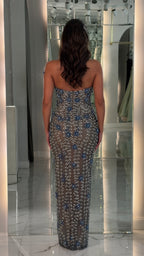 Back view of blue beaded evening gown