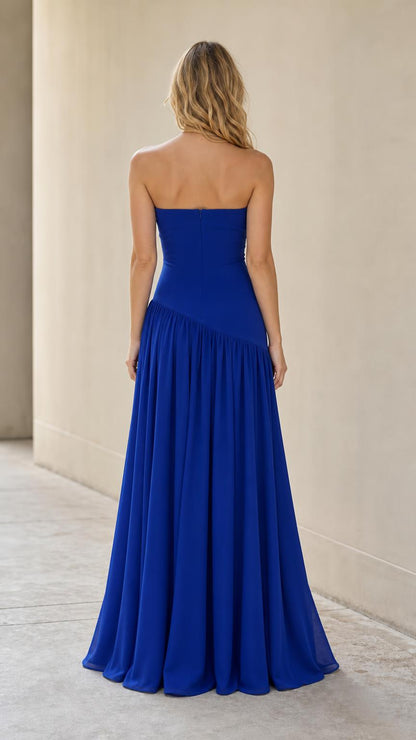 Back view of model in royal blue chiffon maxi dress
