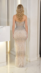Back view of champagne strapless evening gown