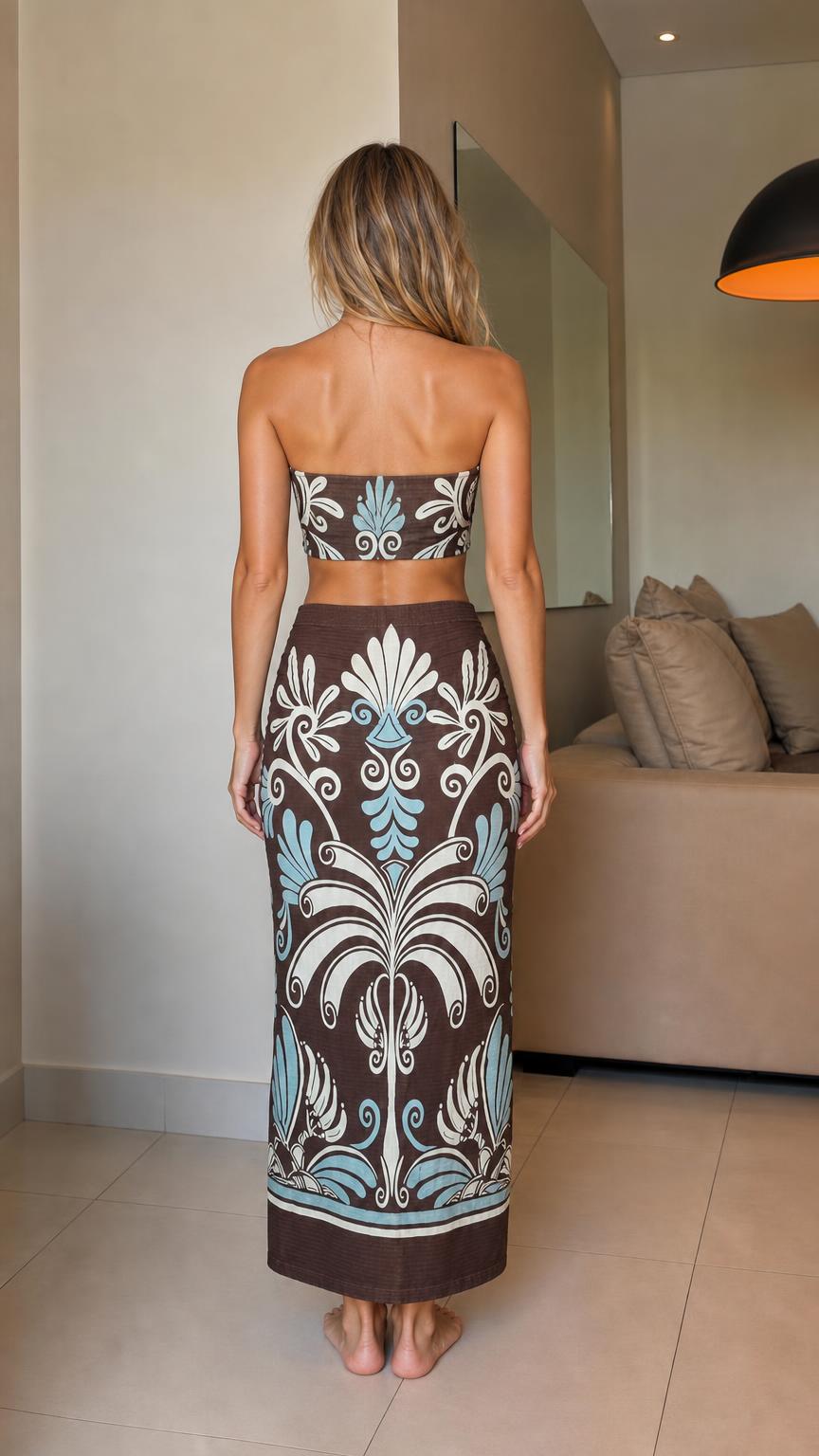 Back view of model wearing brown printed two-piece set