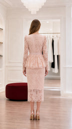Back view of pink lace peplum dress