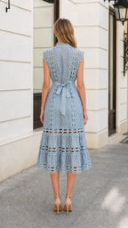 Back view showing tie bow detail on Light Blue lace midi dress