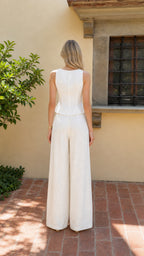 Back view of woman in white matching set