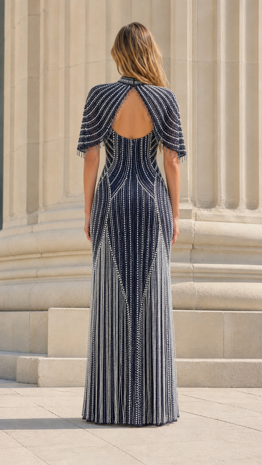 Model wearing navy beaded evening dress back view