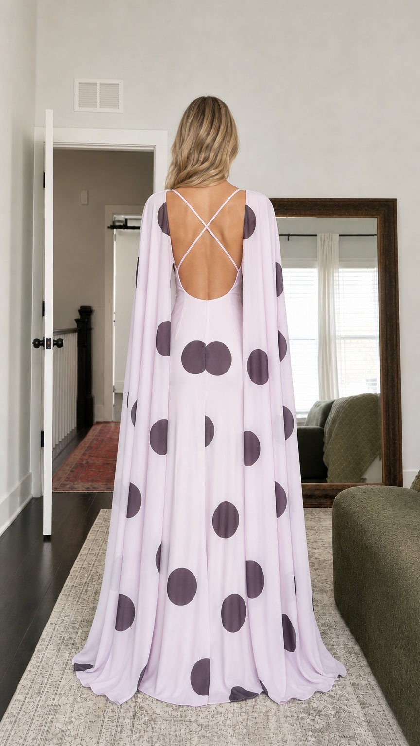 Back view of model showing open back straps on lavender dress