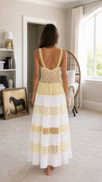 Back view of white tiered crochet maxi dress