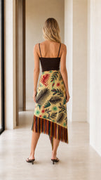 Model wearing yellow wrap skirt back view