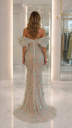 Back view of mint evening gown showing detailed draping