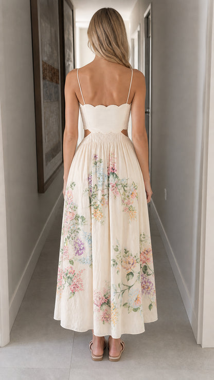 Woman wearing ivory floral cutout midi dress back view