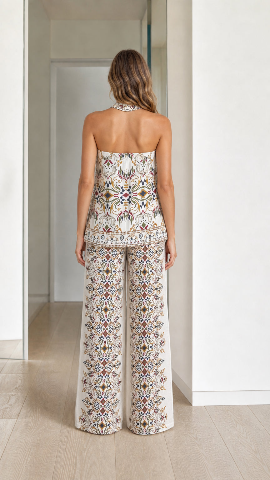 Model wearing cream boho printed two-piece set, back view