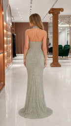 Back view of sage halter beaded evening gown