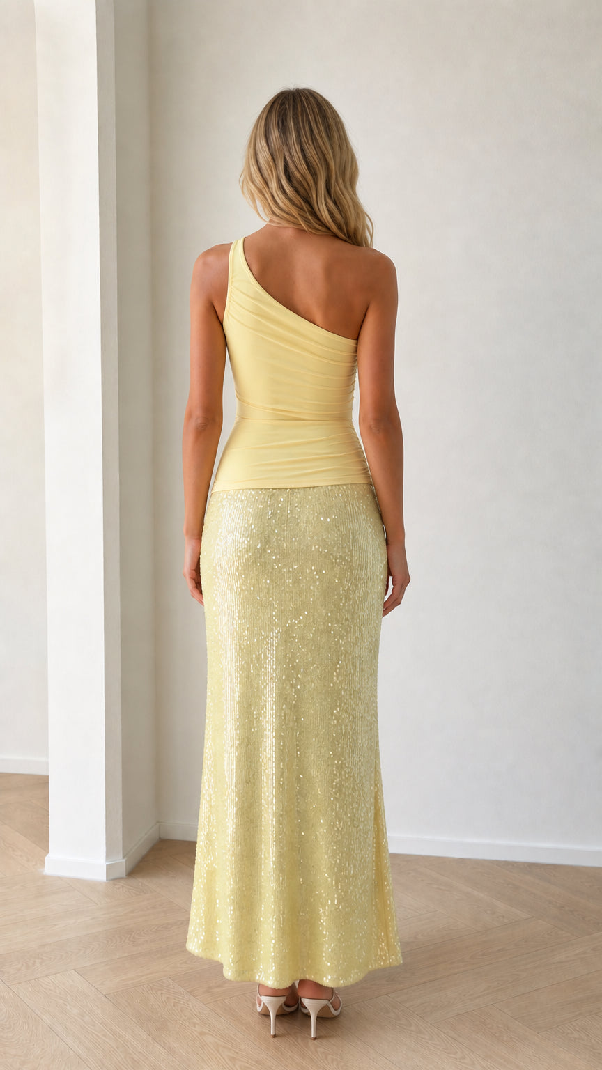 Back view of yellow one-shoulder cutout sequin maxi dress set