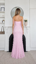 Back view of pink strapless evening gown