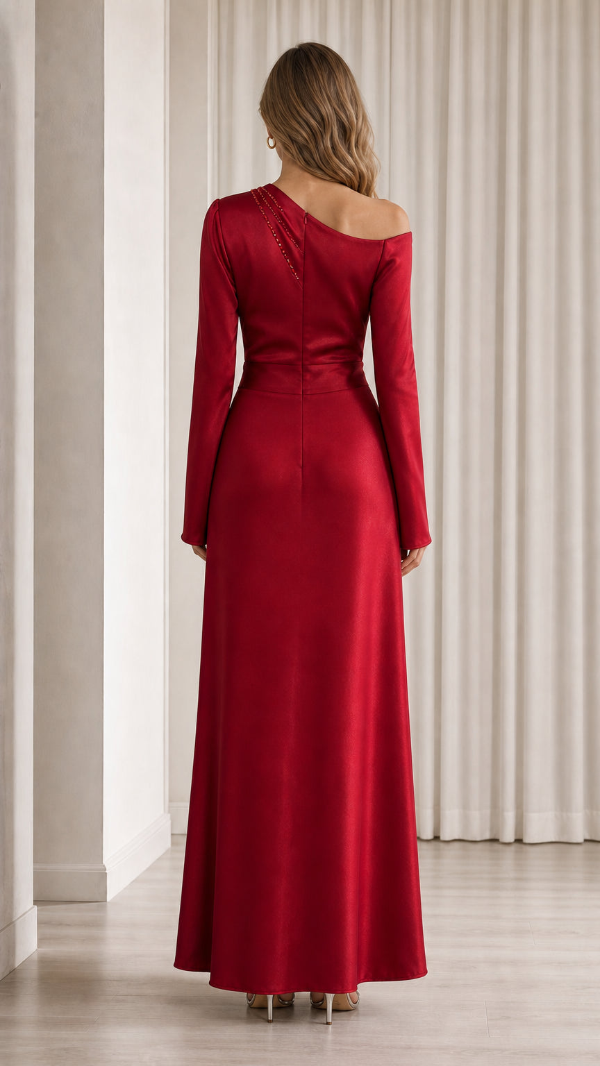 Back view of model in red one-shoulder formal dress