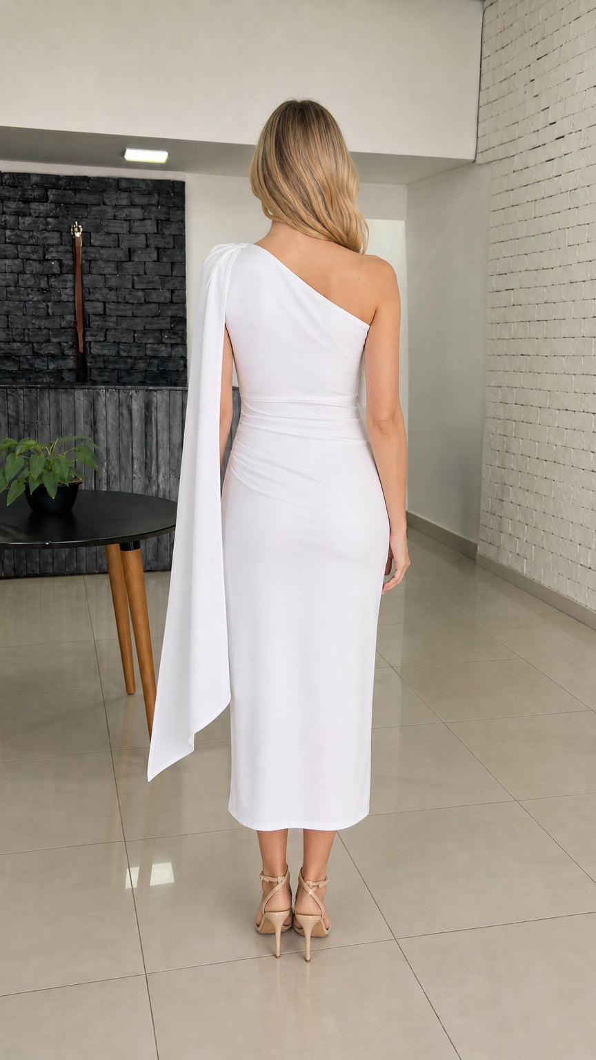 Back view of white one-shoulder dress showcasing the cape overlay