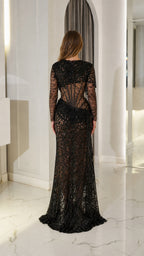Back view of black lace evening gown showing train