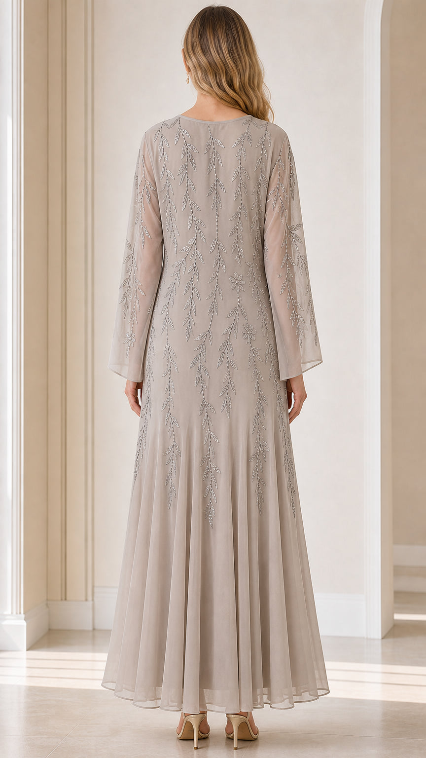 Back view of model showcasing flowing maxi skirt and long sleeves