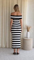 Back view of model wearing black and white striped midi dress