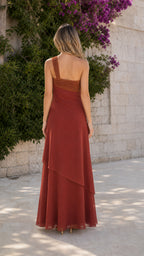 Back view of woman in Rust Red maxi dress