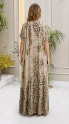 Back view of model in beige animal print kaftan