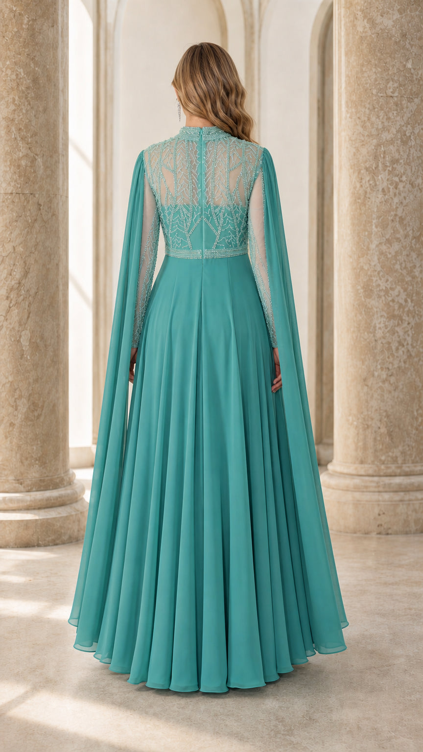 Back view of teal evening dress showcasing cape details