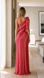 Back view of red one-shoulder sequin dress