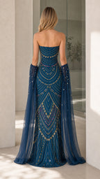 Back view showcasing detailed beadwork on teal blue evening gown