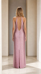 Back view of model showing open back design of mauve maxi dress