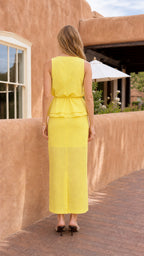 Back view of model in yellow maxi dress