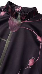 Close-up of mock neck and botanical floral print detail