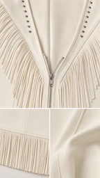 Close-up details of front zipper, studs, fringe, and fabric texture