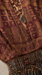 Close up of printed blouse pattern and sleeve detail