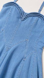 Close-up of Pleated Bustier Detail on Denim Dress
