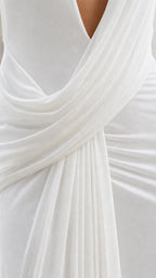 Close-up detail of the waist draping and plunging neckline