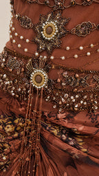 Close-up detail of beaded bodice and jeweled accents