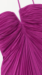 Close-up detail of pleated texture and sweetheart neckline on Fuchsia dress