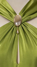 Close-up of gemstone embellished halter neckline and keyhole cutout