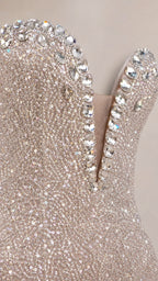 Close-up of crystal embellished plunging neckline