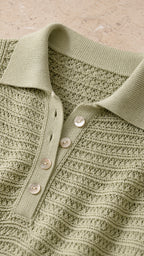 Close-up of polo collar and textured knit pattern on sage green dress