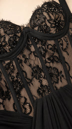 Close-up detail of black lace corset bodice and boning