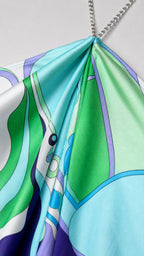 Close-up of fabric texture and chain strap detail